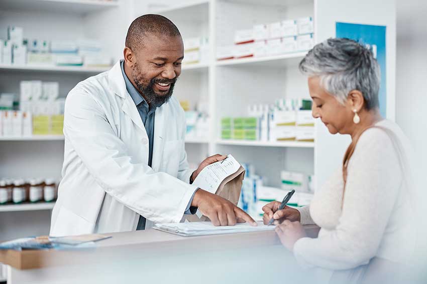 pharmacist-with-prescription-bag